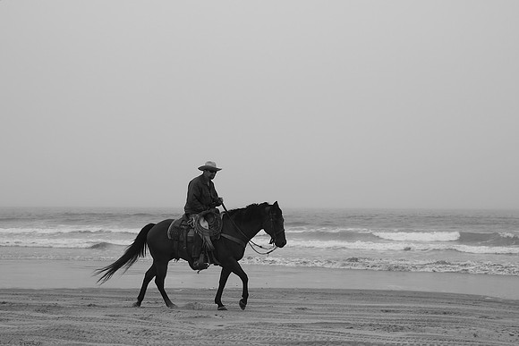 Cowboy on the Beach